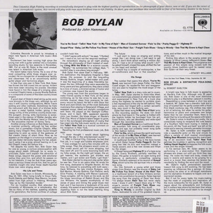 Back cover of a Bob Dylan album with text and a small image of Bob Dylan.