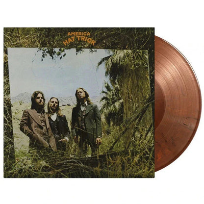 America - Hat Trick (Limited Edition Import, Orange & Black Mix Vinyl) (LP) - Joco Records