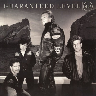 Level 42 - Guaranteed (Limited Edition, Expanded,180-Gram Silver & Black Marble Color Vinyl with Bonus Tracks) (Import) (2 LP) - Joco Records